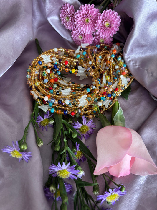 1 strand of 50’ tie on waist beads with glow in the dark butterflies.